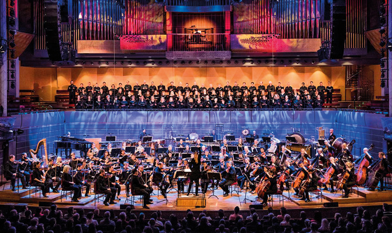 Large orchestra on stage. Photo.