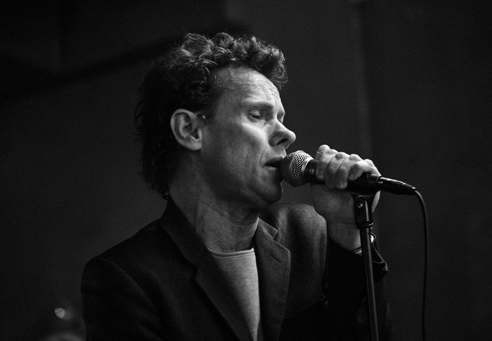 Closeup on man singing. Photo.