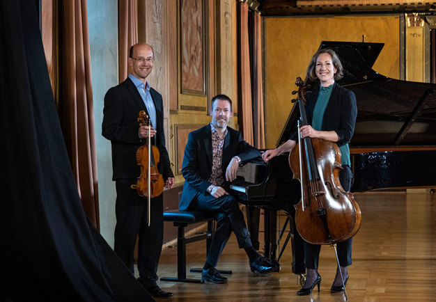 Photo of a ensemble and their instruments. 