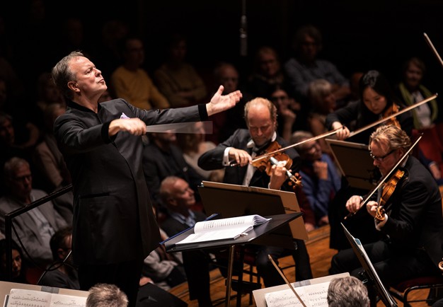 Intense moment of a man conducting. Photography