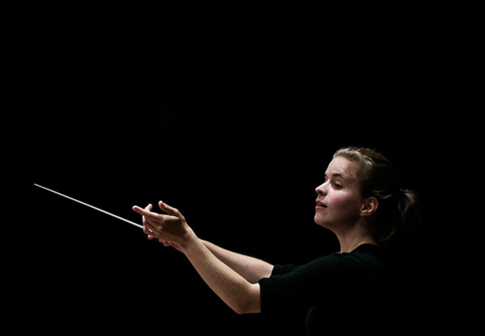 Woman conducting. Photo