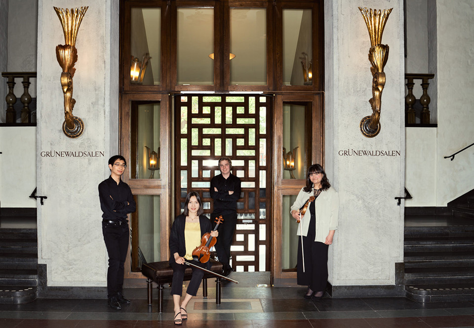 Young musicians with their instruments. Photo.