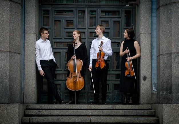 Young musicians with their instruments. Photo