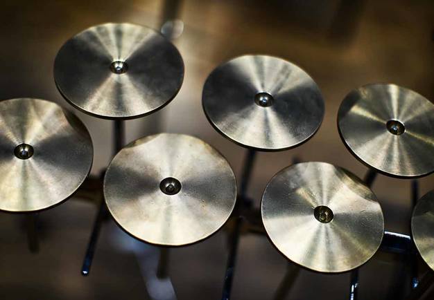 Photo of percussion and round cymbals.