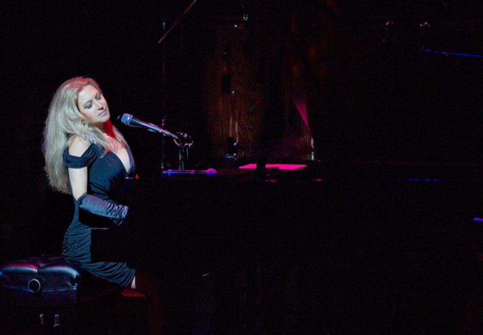 Woman playing piano. Photo