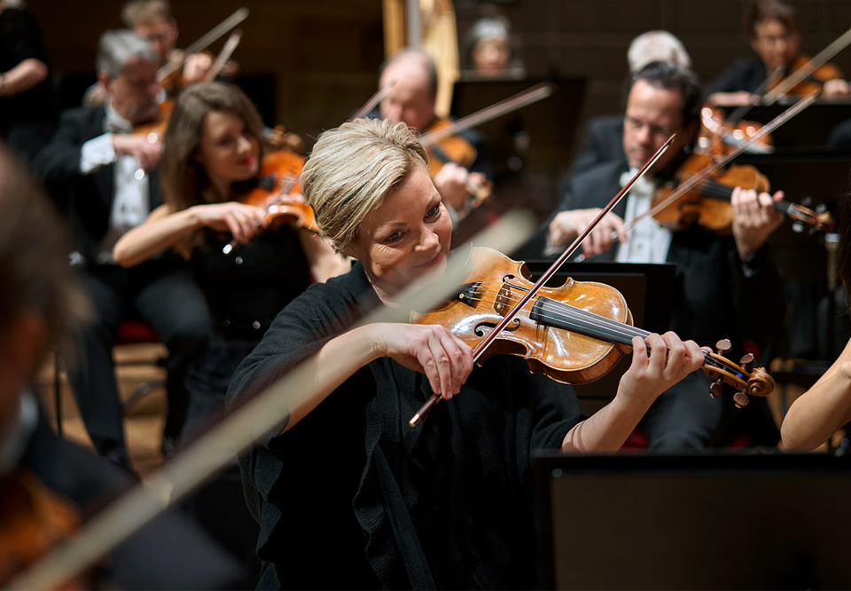 Members of the orchestra playing. 