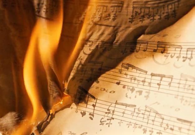 A musicale score in flames.