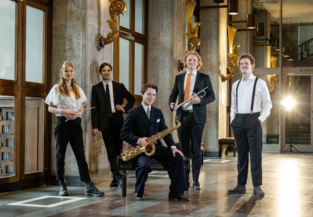 Young musicians with their instruments. Photo