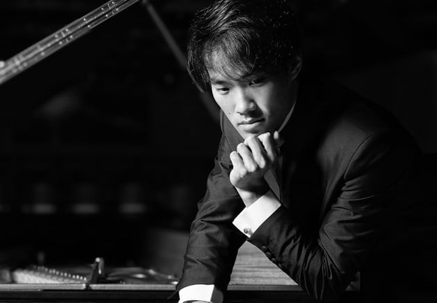 Man vid piano Fotografi.