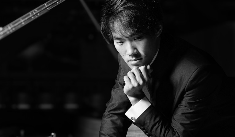 Man vid piano Fotografi.