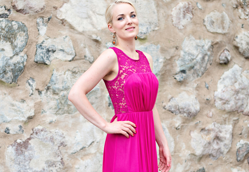 Woman with a pink dress. Photo.