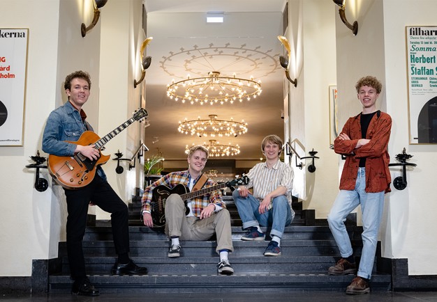 Young musicians with their instruments. Photo