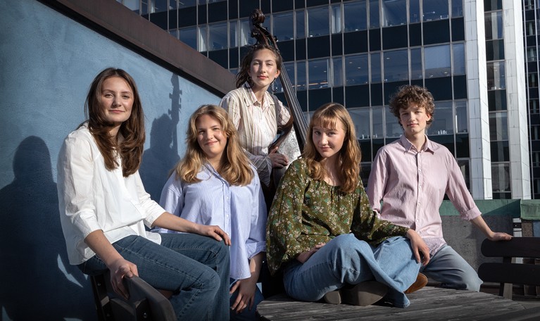 Five girl looking into the camera. Photo.